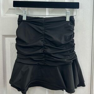 Small black circle skirt with ruched waist